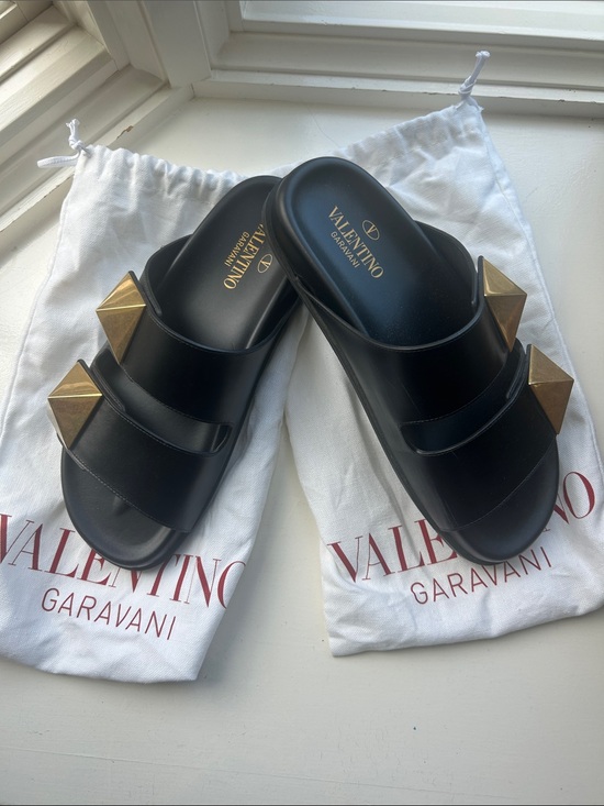 Valentino Garavani Shoes - Valentino Garavani Black Leather Slides with Gold Pyramid Studs